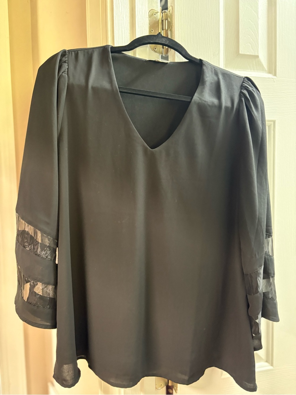 JODIFL Black V-Neck Blouse with Sheer Sleeve Stripes
